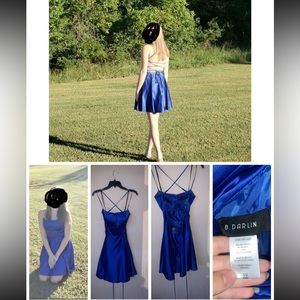 A beautiful blue dress that is silky and it has a cross and tie in back.